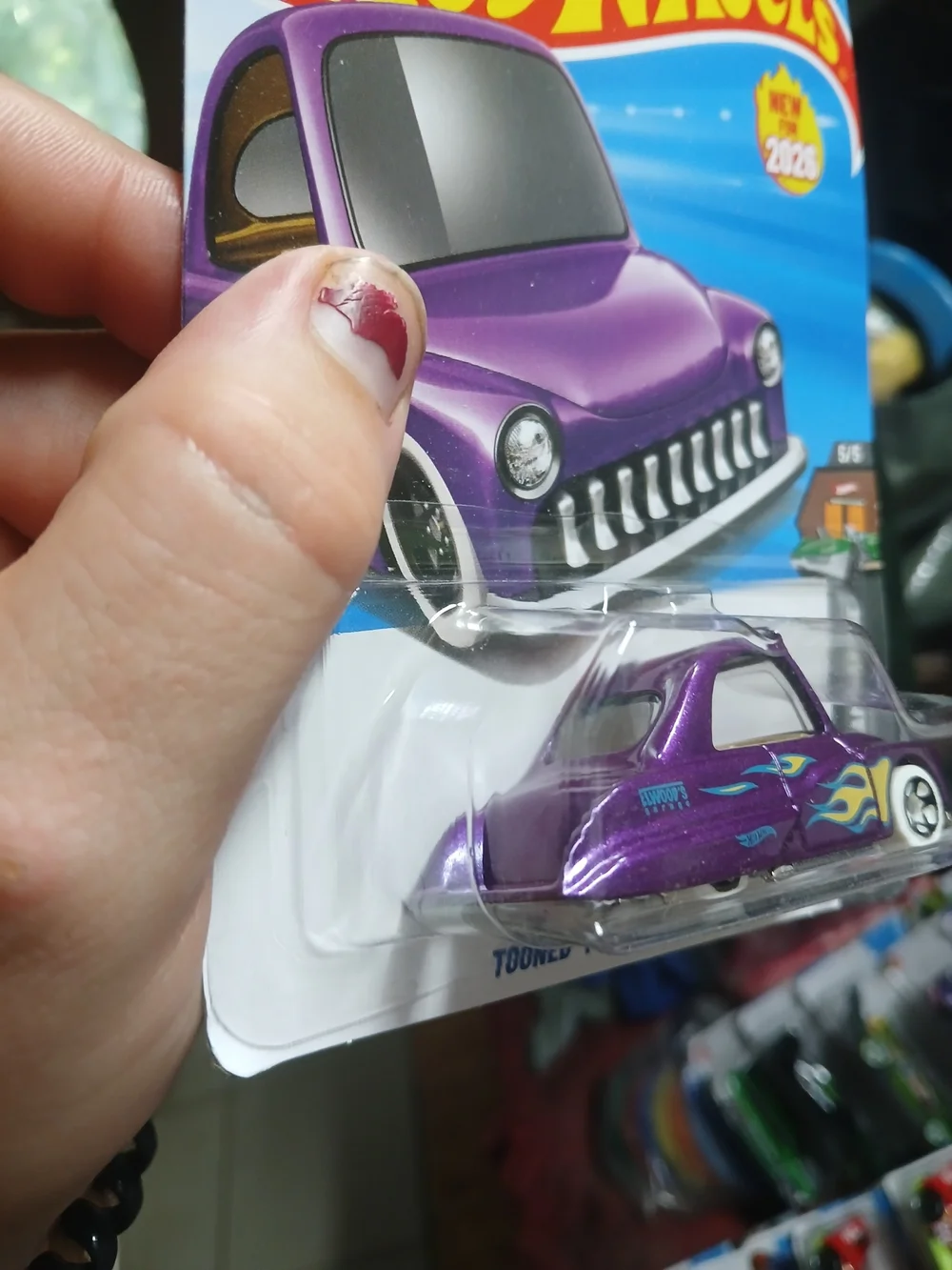 the Tooned Purple Passion from the HW Dream Garage series (numbered 5/5 and 148/